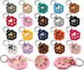 Colourful paw-shaped pet fur keepsake keychains filled with different coloured fur