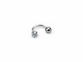 Silver curved body piercing with white zirconia on white studio background