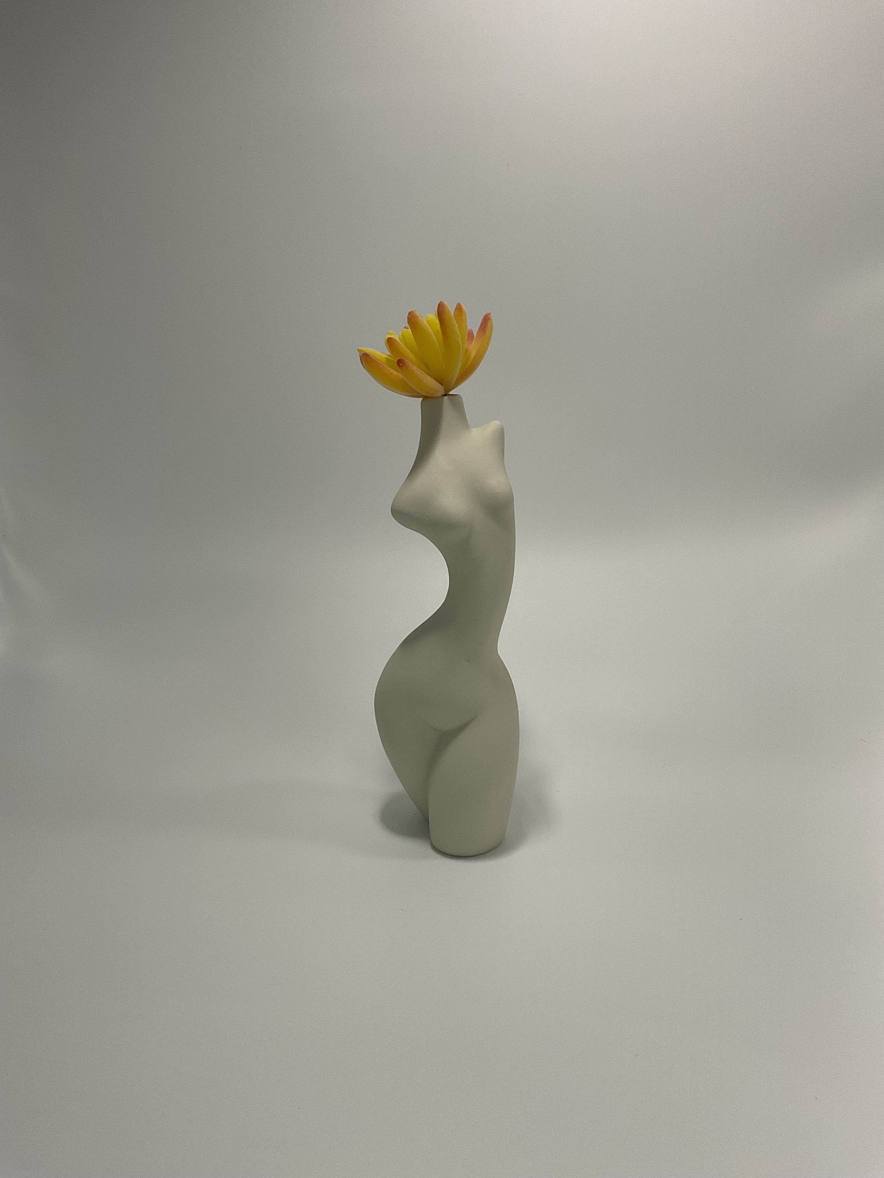 Ceramic white female form vase