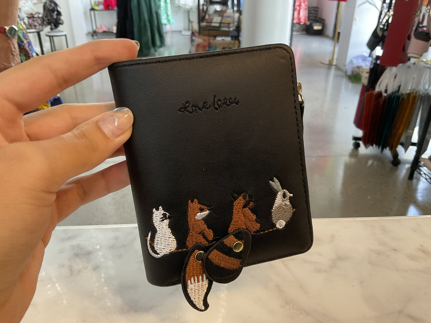 Animal purse with moving tails