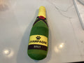Peluche bouteille de champagne 